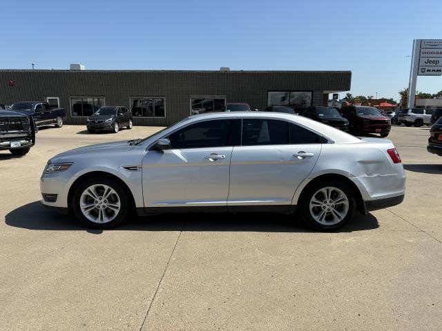 Used 2015 Ford Taurus SEL with VIN 1FAHP2E81FG100574 for sale in Winner, SD